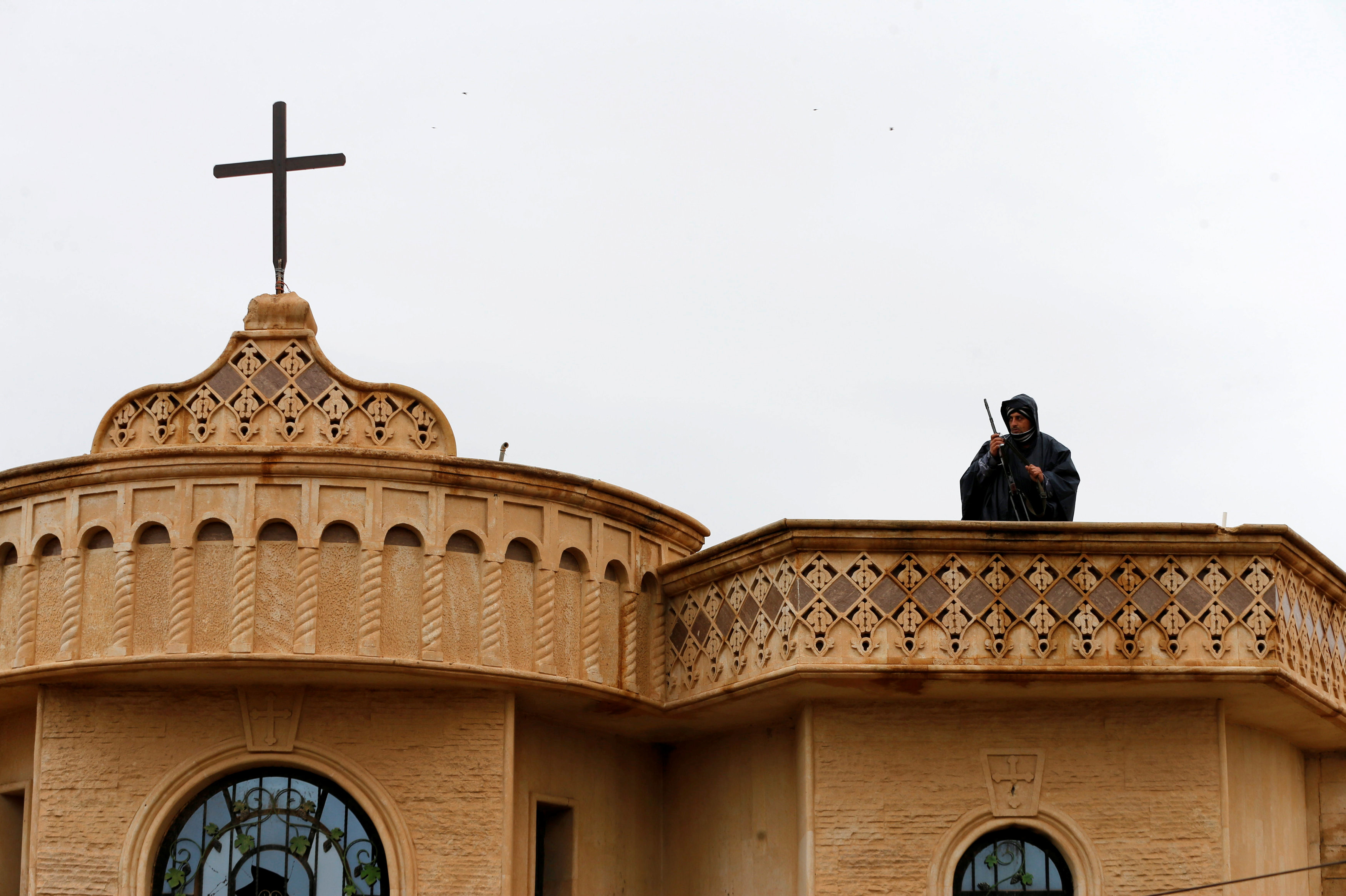 مسيحيون فى بلدة برطلة العراقية