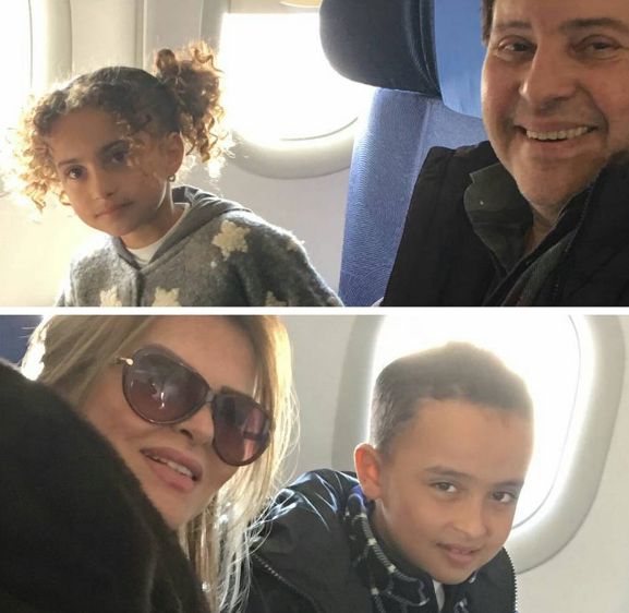 هانى شاكر وزوجته وأحفاده على متن الطائرة