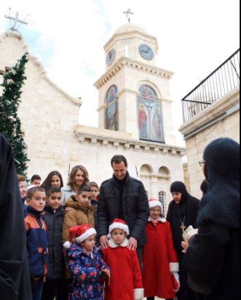 بشار الأسد وزوجته يحتفلا بعيد الميلاد المجيد فى سوريا