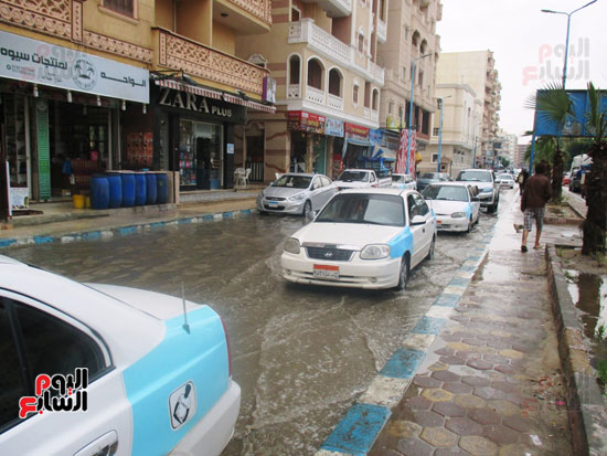 تساقط الأمطار بشارع 23 يوليو أمام استاد النادى المصرى