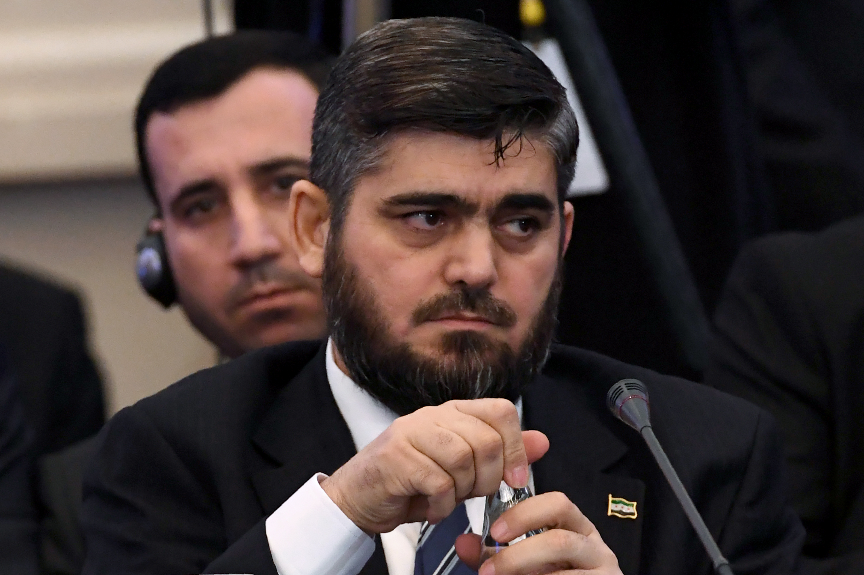 محمد علوش رئيس وفد الفصائل المعارضة السورية خلال مشاركته بمؤتمر أستانة