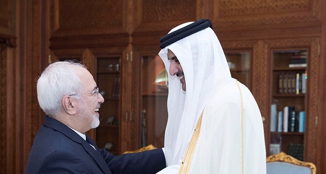 تميم ووزير خارجية إيران خلال زيارته  أوائل اكتوبر الجارى إلى الدوحة