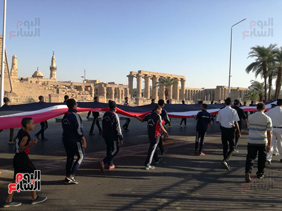 شباب الأقصر يشاركون فى مسيرة نصر اكتوبر