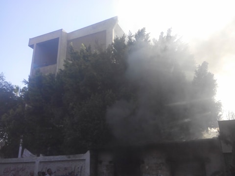 حريق بمحلات بجانب المدرسة