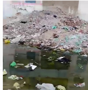 القمامة ومياه الصرف بالمدينة