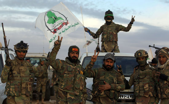 قوات الحشد الشعبى تحتفل بالانتصار على داعش