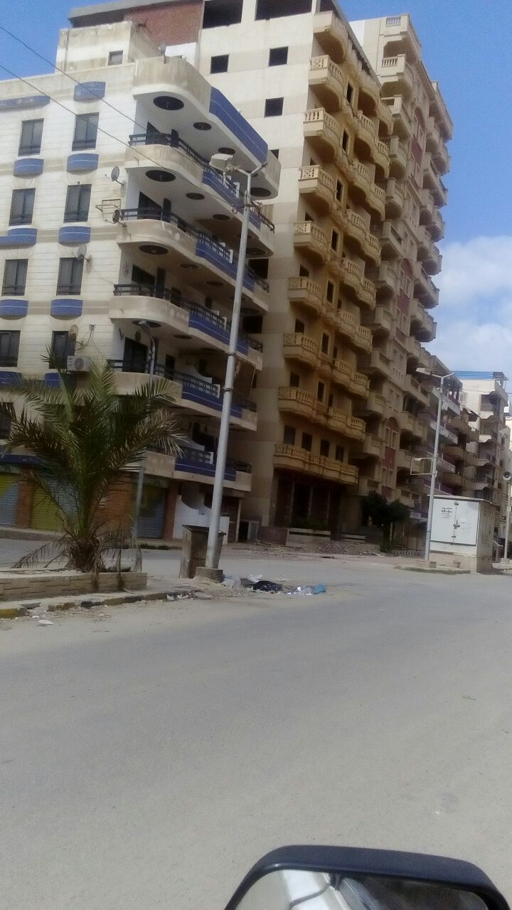 ابراج سكنية مخالفة بقرية النخيل بالعجمى