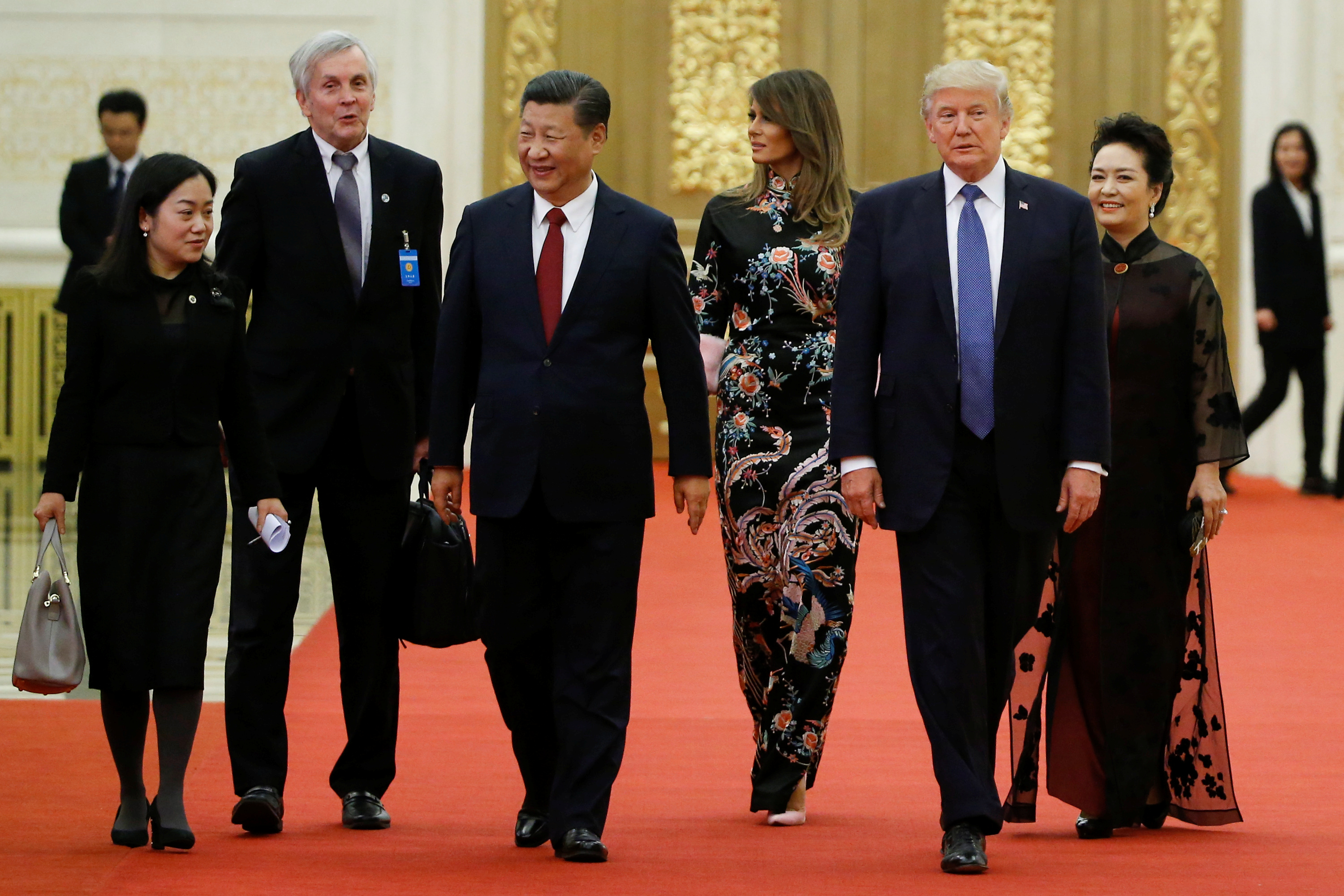 الرئيس الصينى وقرينته بصحبه ترامب وقرينته