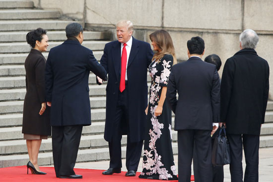 الرئيس-الصينى-يصافح-ترامب