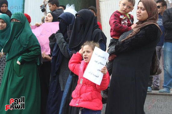 طفلة ترفع لافتة القدس عربية