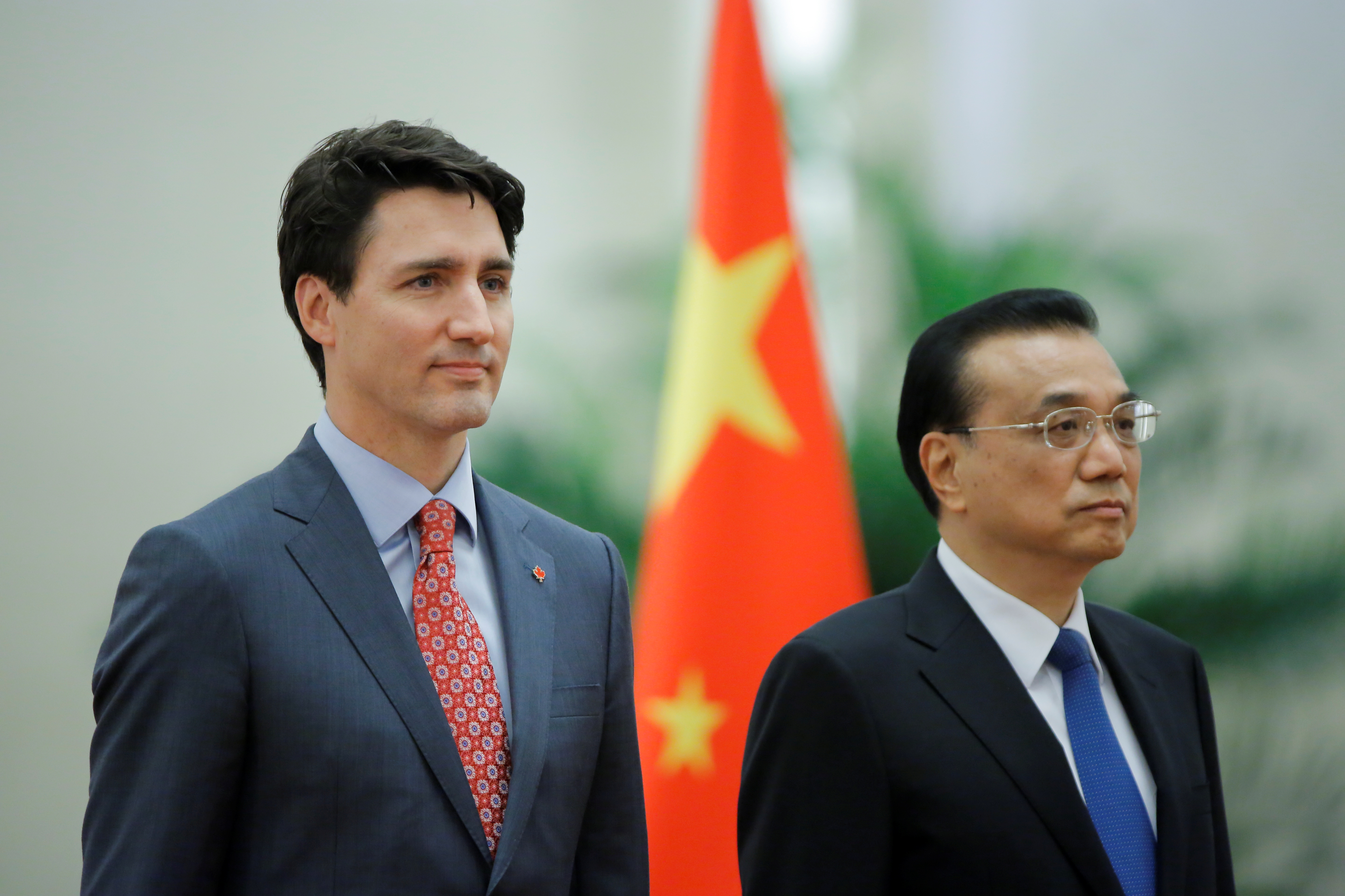 رئيس الوزراء الكندى جوستين ترودو ورئيس مجلس الدولة الصينى لى كه تشيانغ