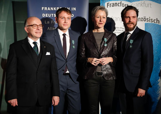 دانيال برول وماكس ريميلت وبيرجريت كولير  مع رئيس الوزراء الفرنسي
