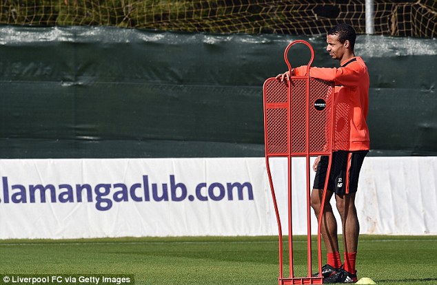 3D4ACA0200000578-4252028-The_Liverpool_defender_pictured_enjoying_a_rest_during_a_trainin-a-7_1487842303061