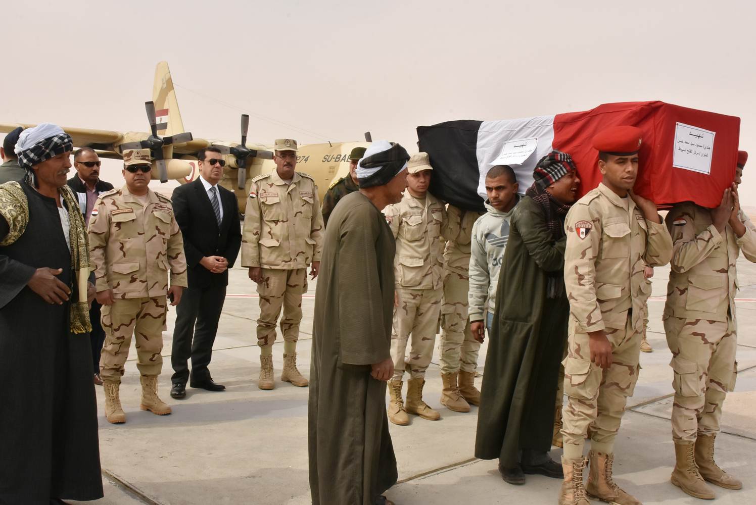 محافظ أسيوط يستقبل جثمان شهيد الواجب فى سيناء بمطار أسيوط الدولي