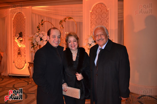 خالد زكى وحرمه ونجلهما تامر