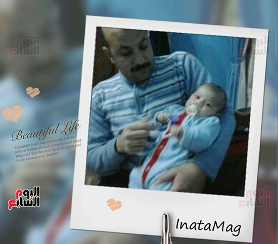  الشهيد المقدم أحمد أبو الدهب مع أحد أبنائه 