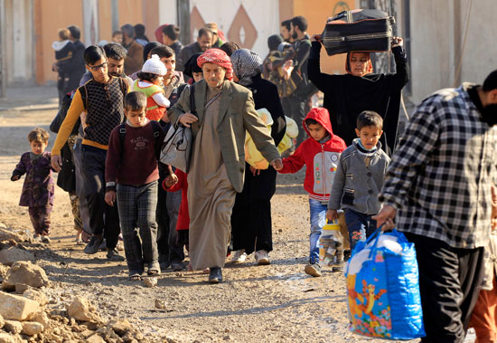 الأسر النازحة من الموصل هربا من داعش