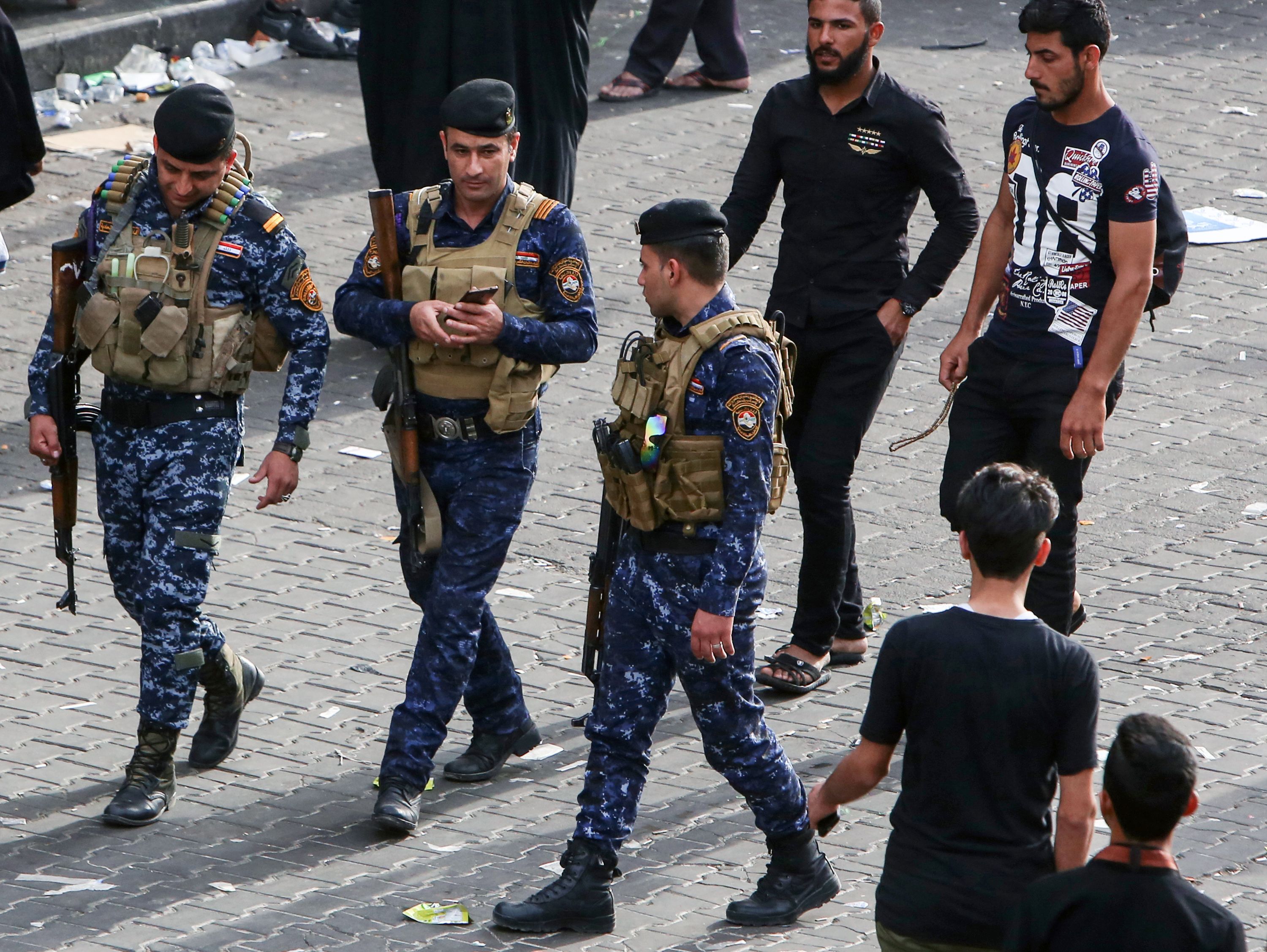الشرطة العراقية تؤمن احتفالات الشيعة فى بغداد