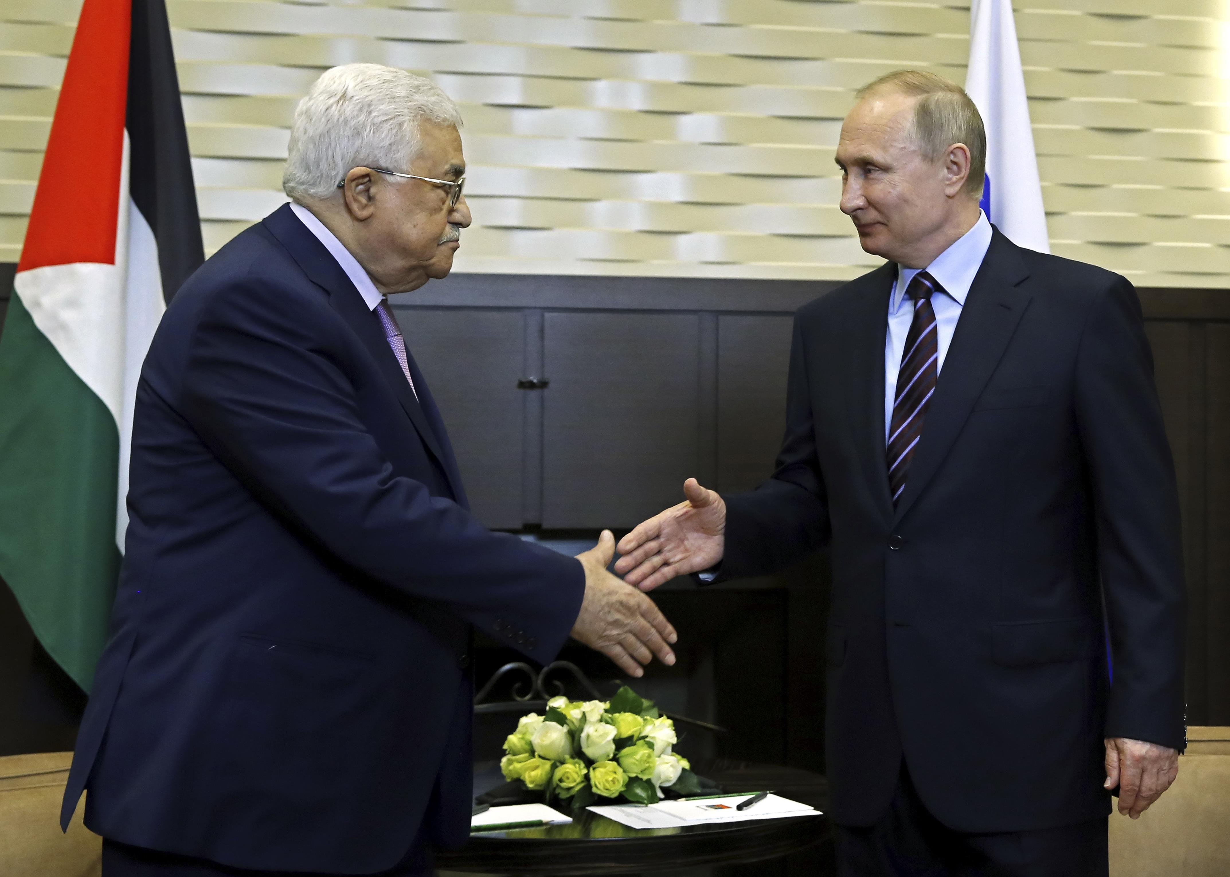 بوتين يستقبل محمود عباس
