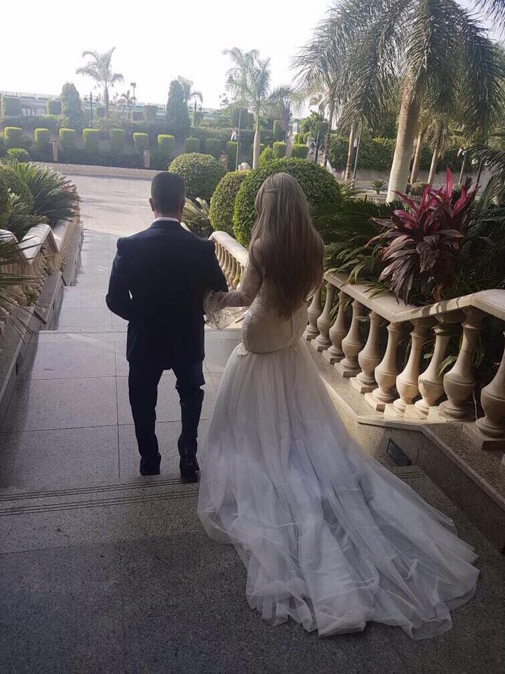 العميد محمد سمير وزوجته الإعلامية إيمان أبو طالب