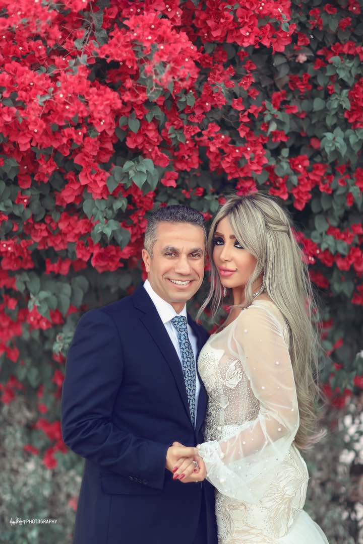 العميد محمد سمير وزوجته إيمان أبو طالب