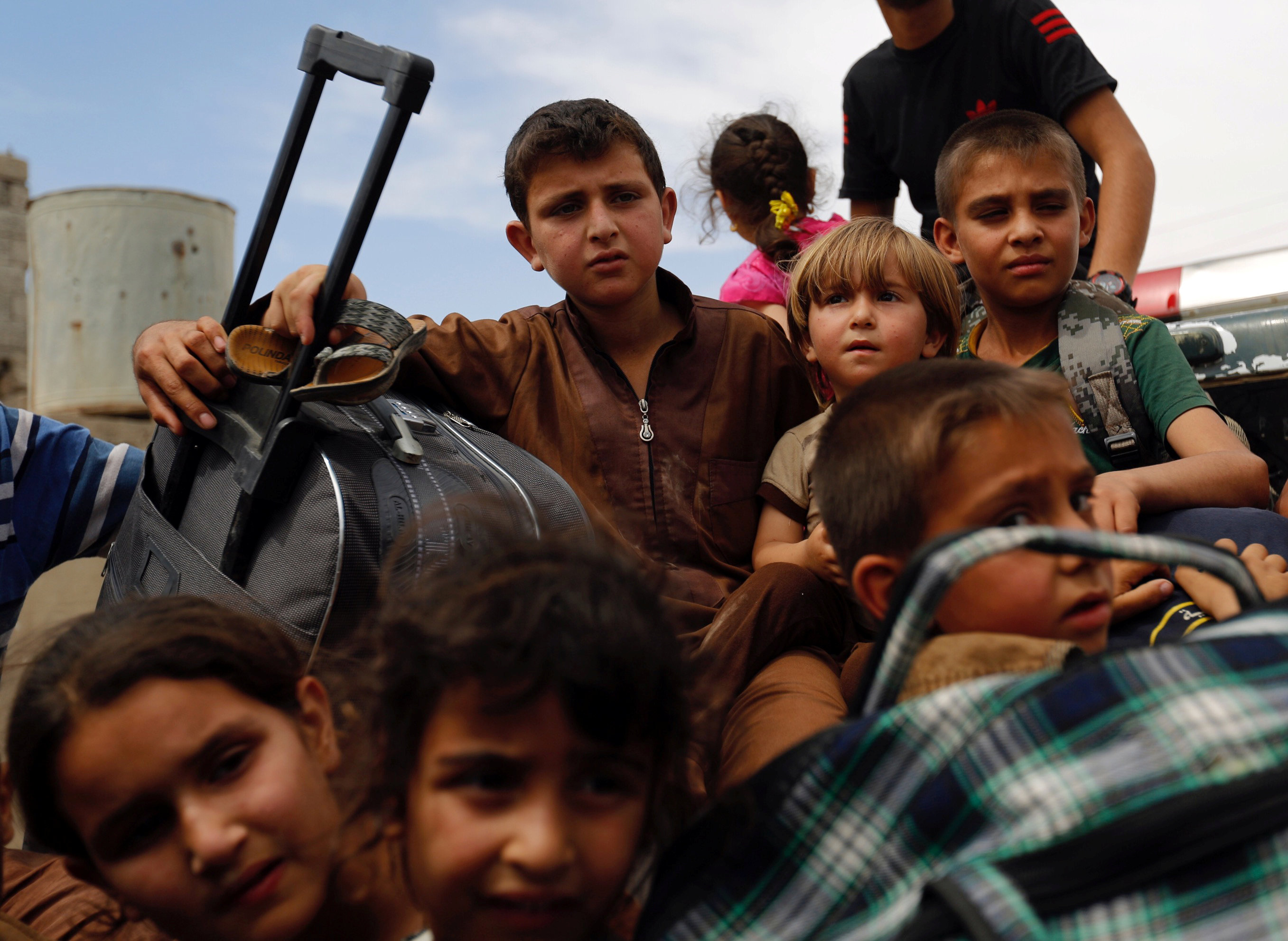 أطفال مدينة الموصل  بعد الاشتباكات بين القوات العراقية وتنظيم داعش الإرهابى