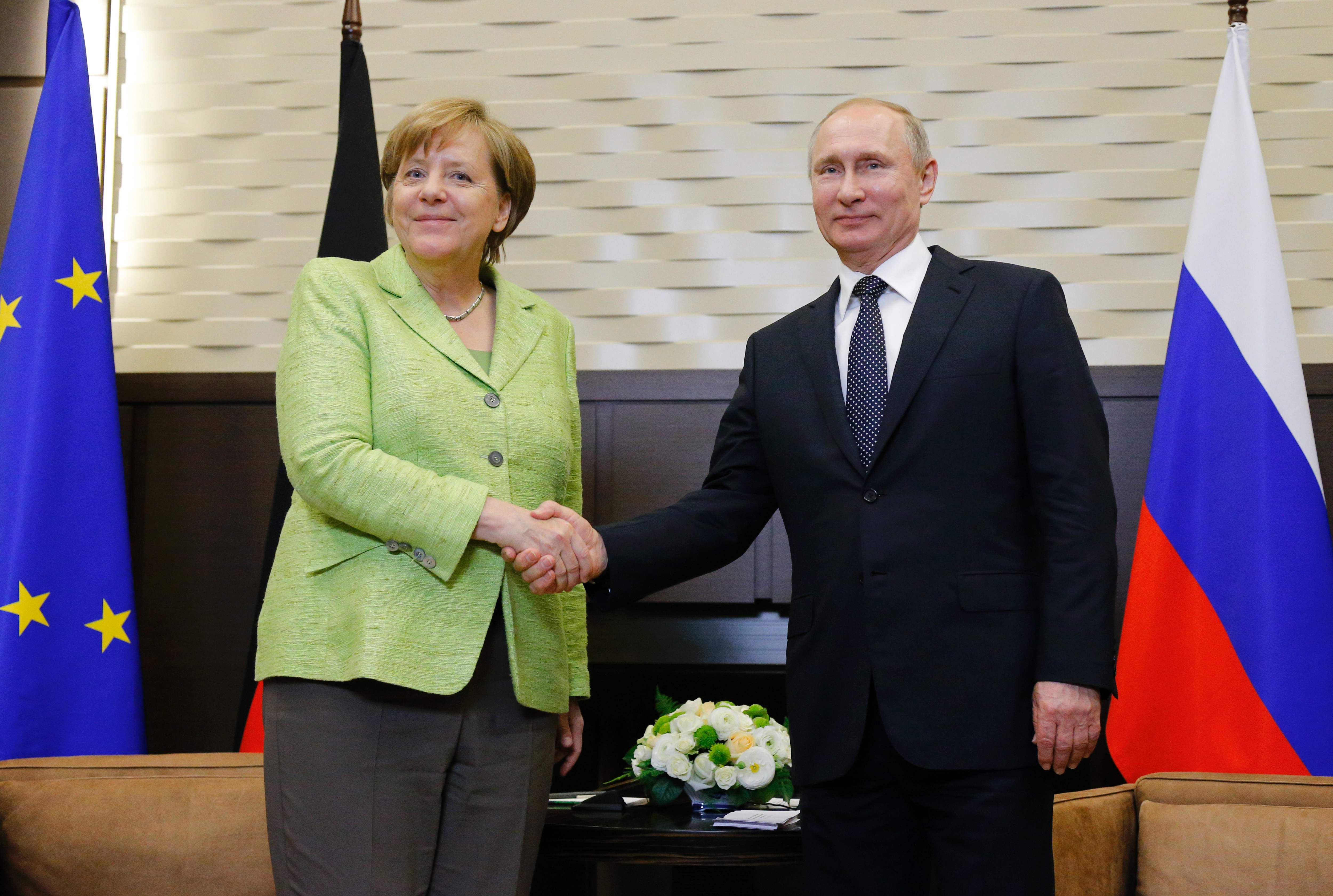 الرئيس الروسى والمستشارة الالمانية
