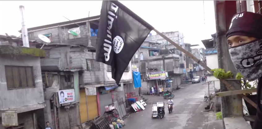 أعلام داعش في المدينة