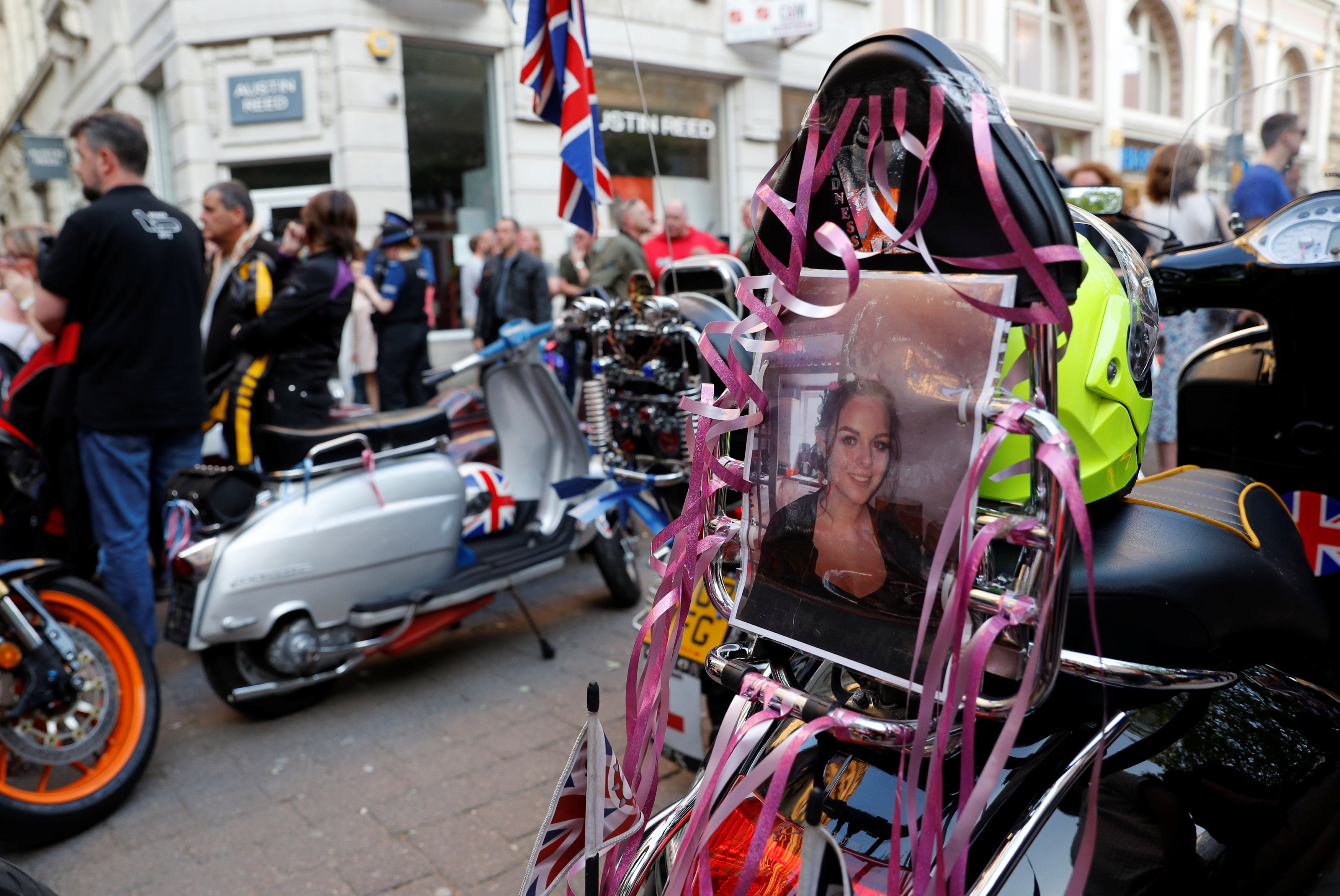 صورة أحدى الضحايا على دراجة بخارية فى المسيرة