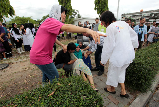 سيدة مصابة إثر التفجير فى تايلاند