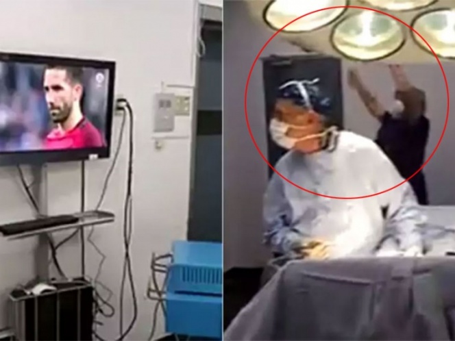 طبيب يشاهد مباراة اثناء قيامه بعملية جراحية