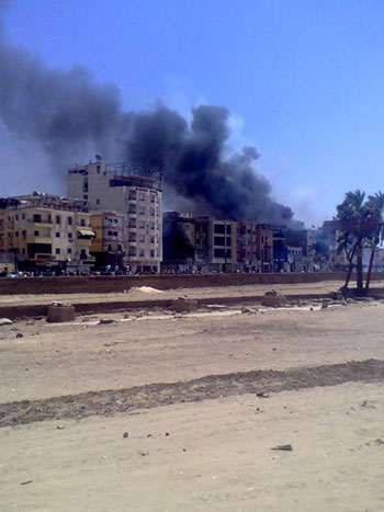 الشرطة تسيطر على حريق فندق خلال فض رابعة بمحافظة الأقصر