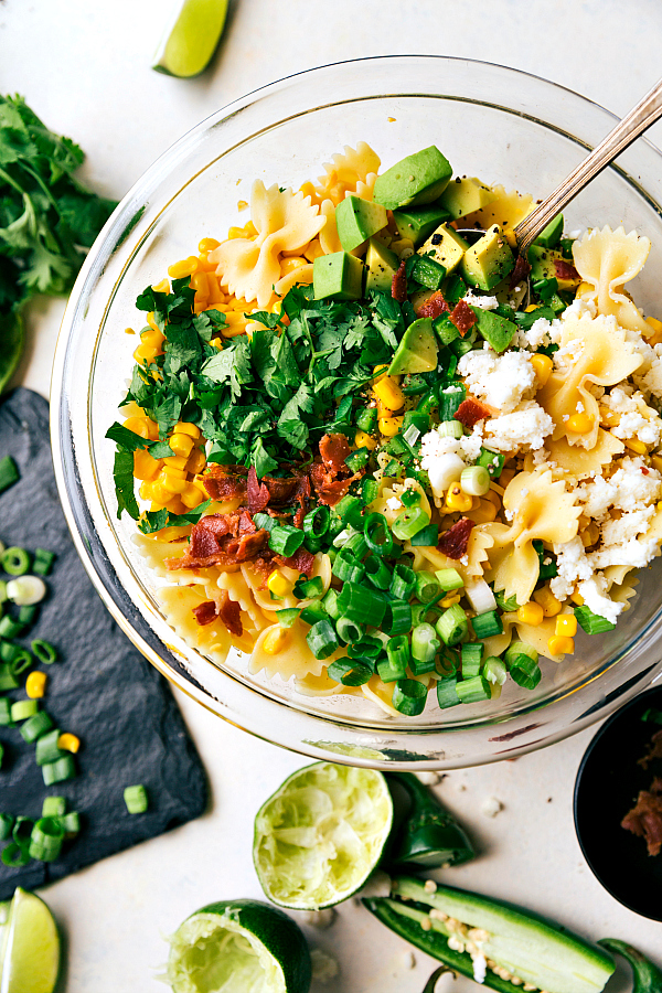 A-delicious-Mexican-Street-Corn-Pasta-salad-with-tons-of-veggies-and-a-simple-creamy-dressing.-Recipe-from-chelseasmessyapron.com_