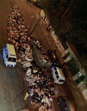 تلال القمامة فى الشارع