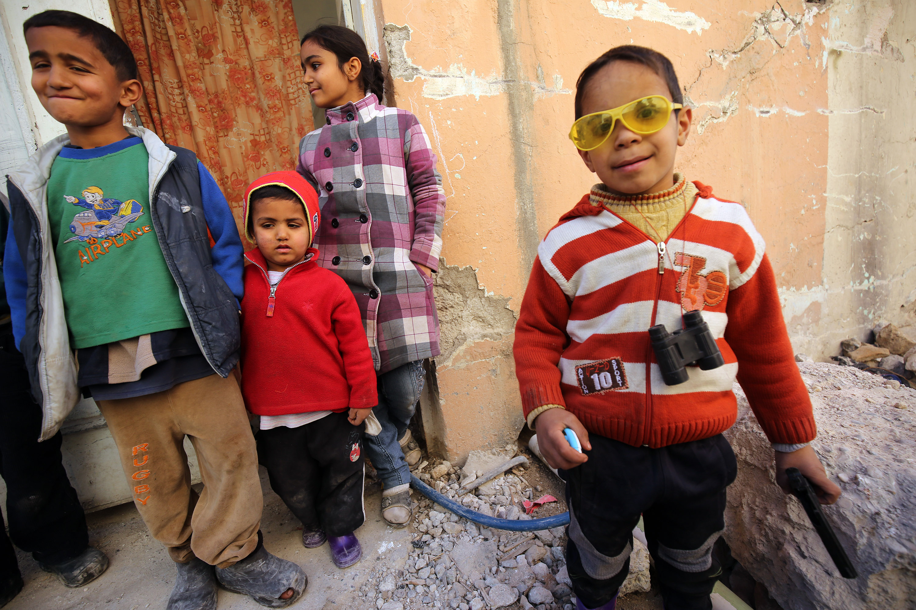 فرحة الأطفال العراقيين بعودتهم لمنازلهم فى مدينة الموصل