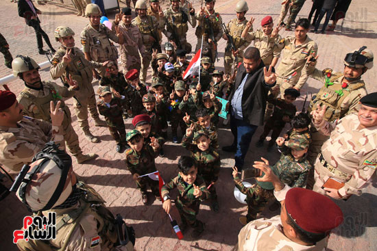 أطفال العراقى يشاركون قوات الجيش ذكرى التأسيس