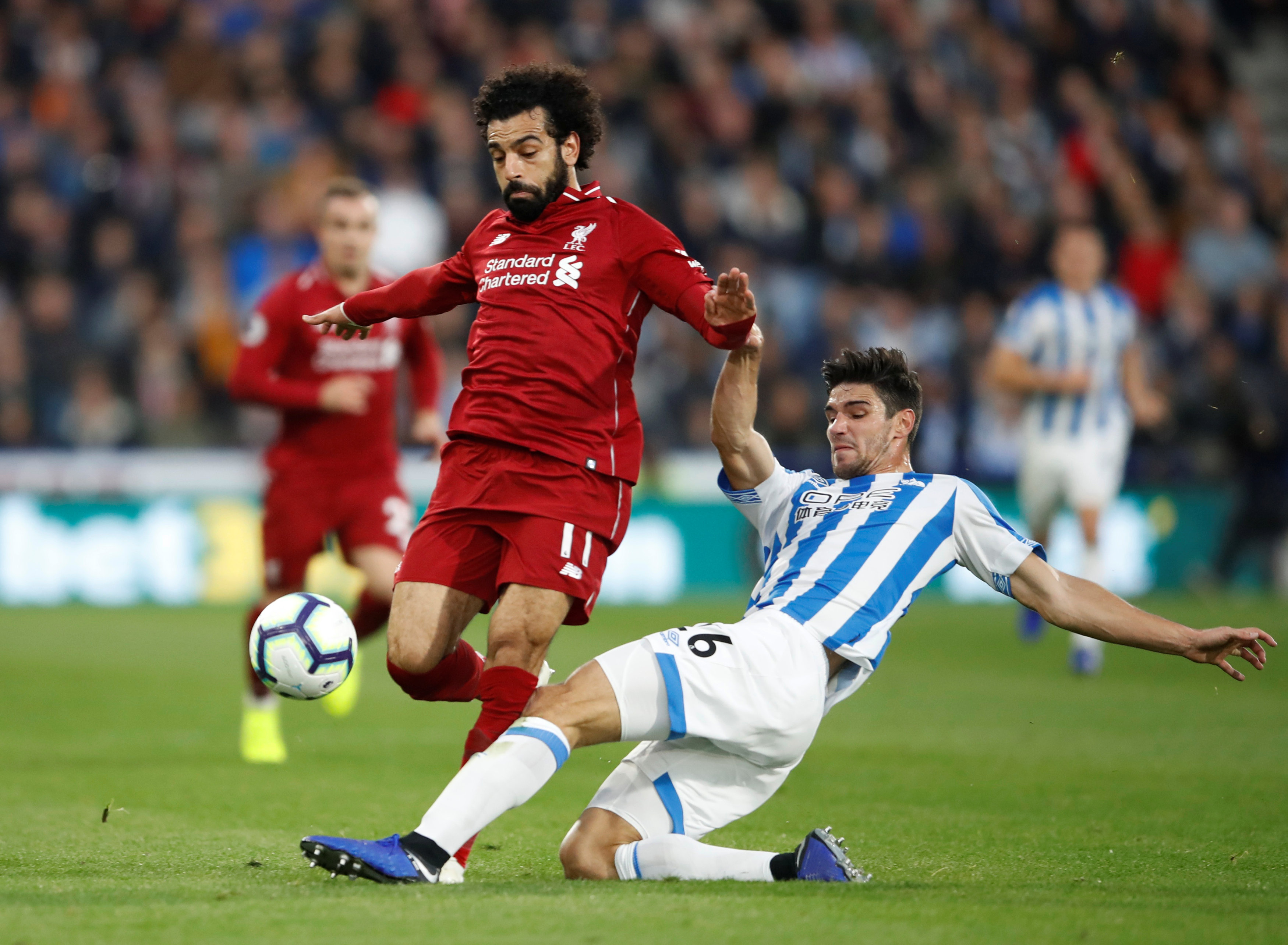 محمد صلاح خلال لقاء ليفربول وهدرسفيلد