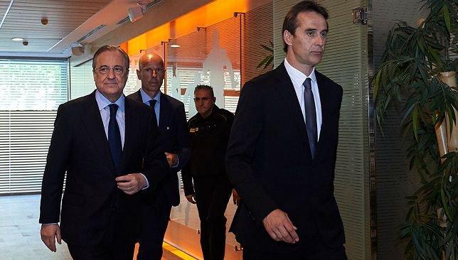 لوبيتيجي مع رئيس ريال مدريد