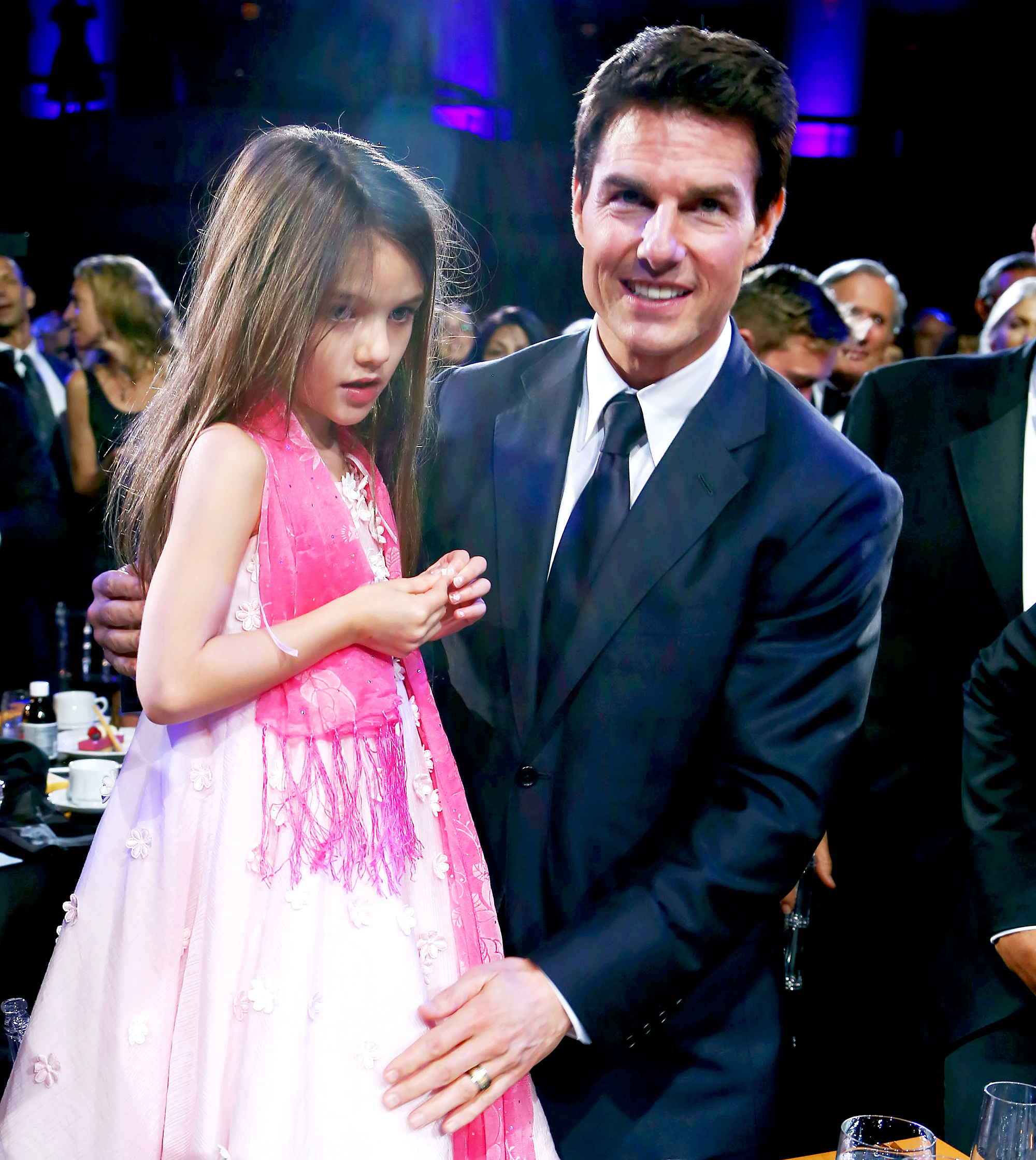 توم كروز مع ابنته فى أحد الحفلات عام 2012