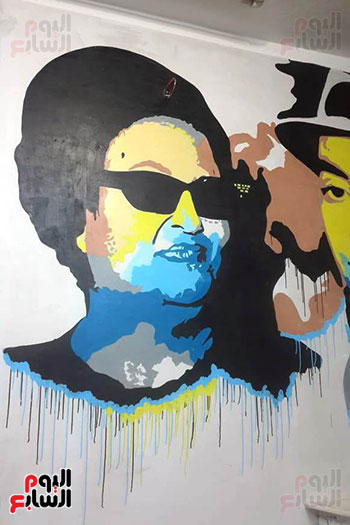 ياسر الدينارى.. رسام احترف فن  الجرافيتى وجداريات الشوارع ببنى سويف (14)