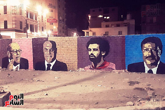 ياسر الدينارى.. رسام احترف فن  الجرافيتى وجداريات الشوارع ببنى سويف (13)