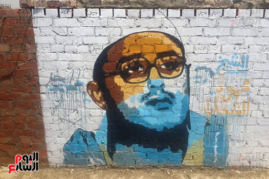 ياسر الدينارى.. رسام احترف فن  الجرافيتى وجداريات الشوارع ببنى سويف (4)