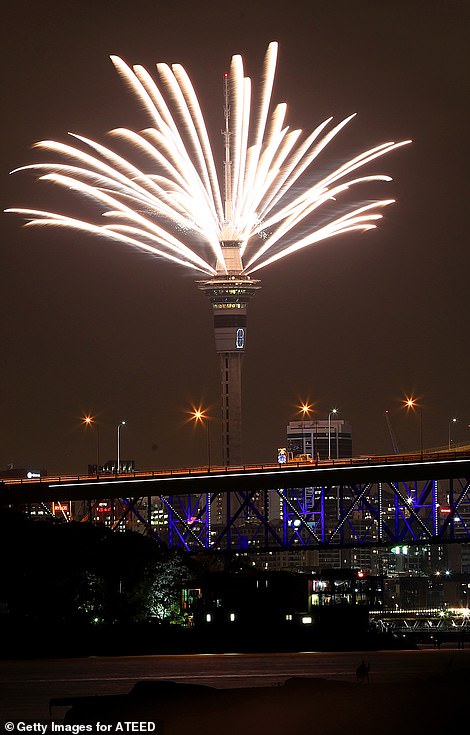 7983756-6541611-Fireworks_explode_from_the_Sky_Tower_during_Auckland_s_New_Year_-m-82_1546257254721