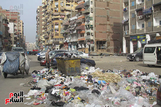انتشار القمامة بشارع التلاتينى الشهير ببورسعيد