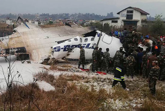 جانب من تحطم طائرة ركاب من بنجلادش أثناء هبوطها فى مطار بنيبال