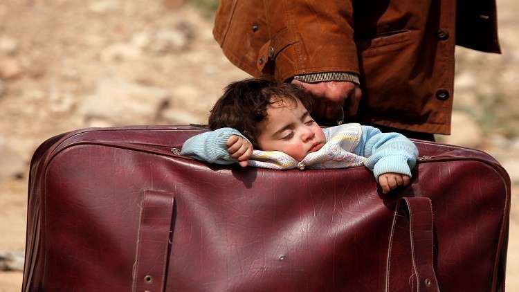 طفل الحقيبة فى الغوطة السورية 