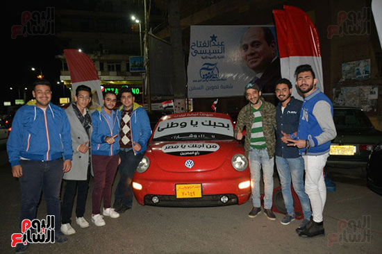 لافتة على سيارة لحث المواطنين على المشاركة بالانتخابات فى بورسعيد (1)