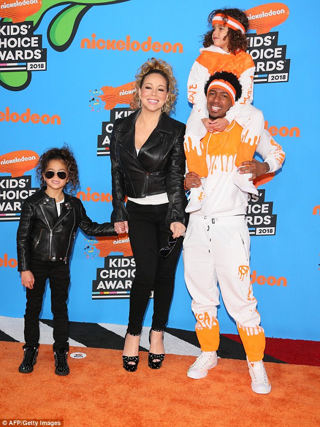 4A871A1F00000578-5552793-One_happy_family_Nick_Cannon_37_and_Mariah_Carey_48_accompanied_-a-21_1522220602511