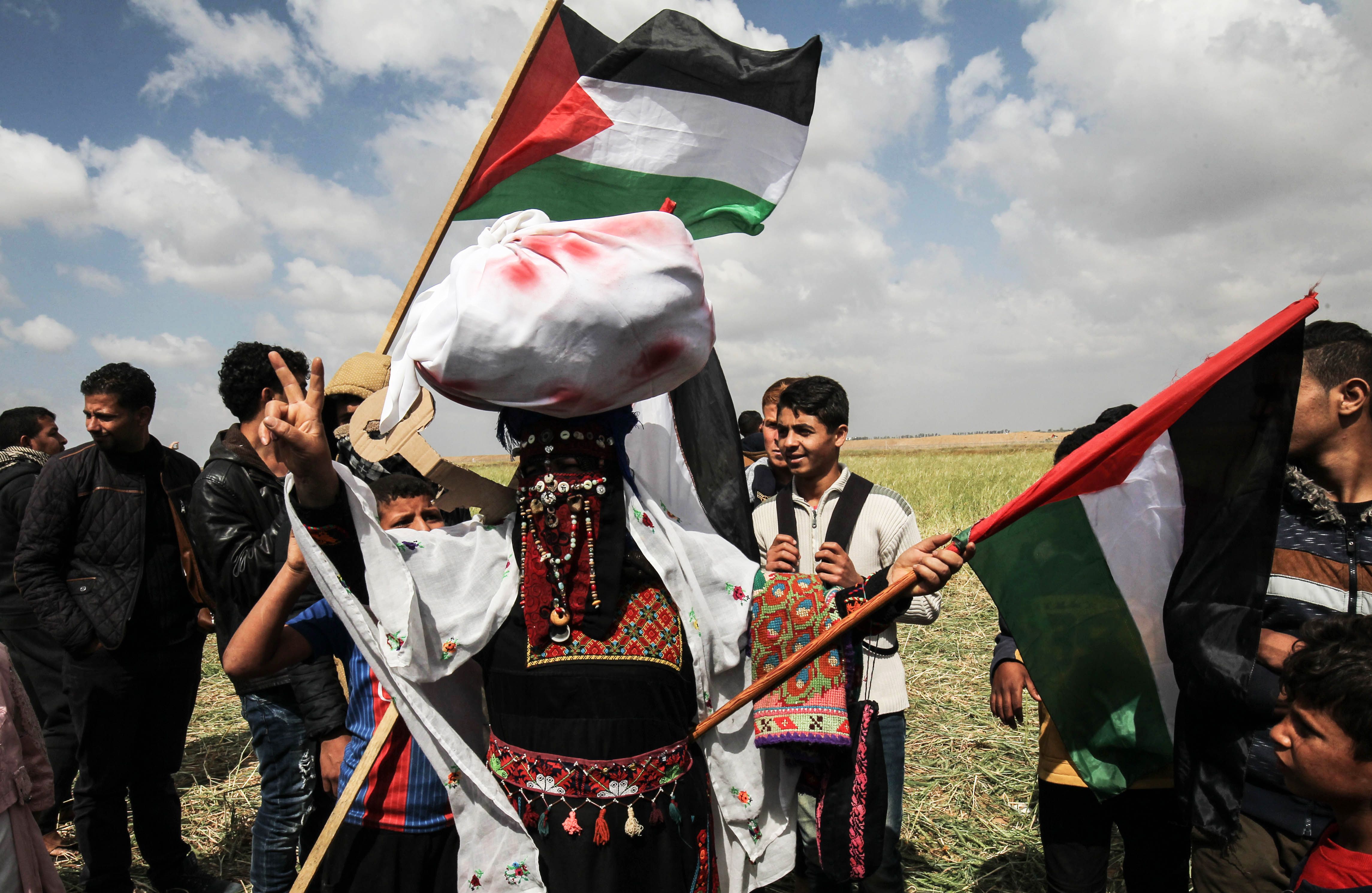 امرأة فلسطينية خلال المواجهات