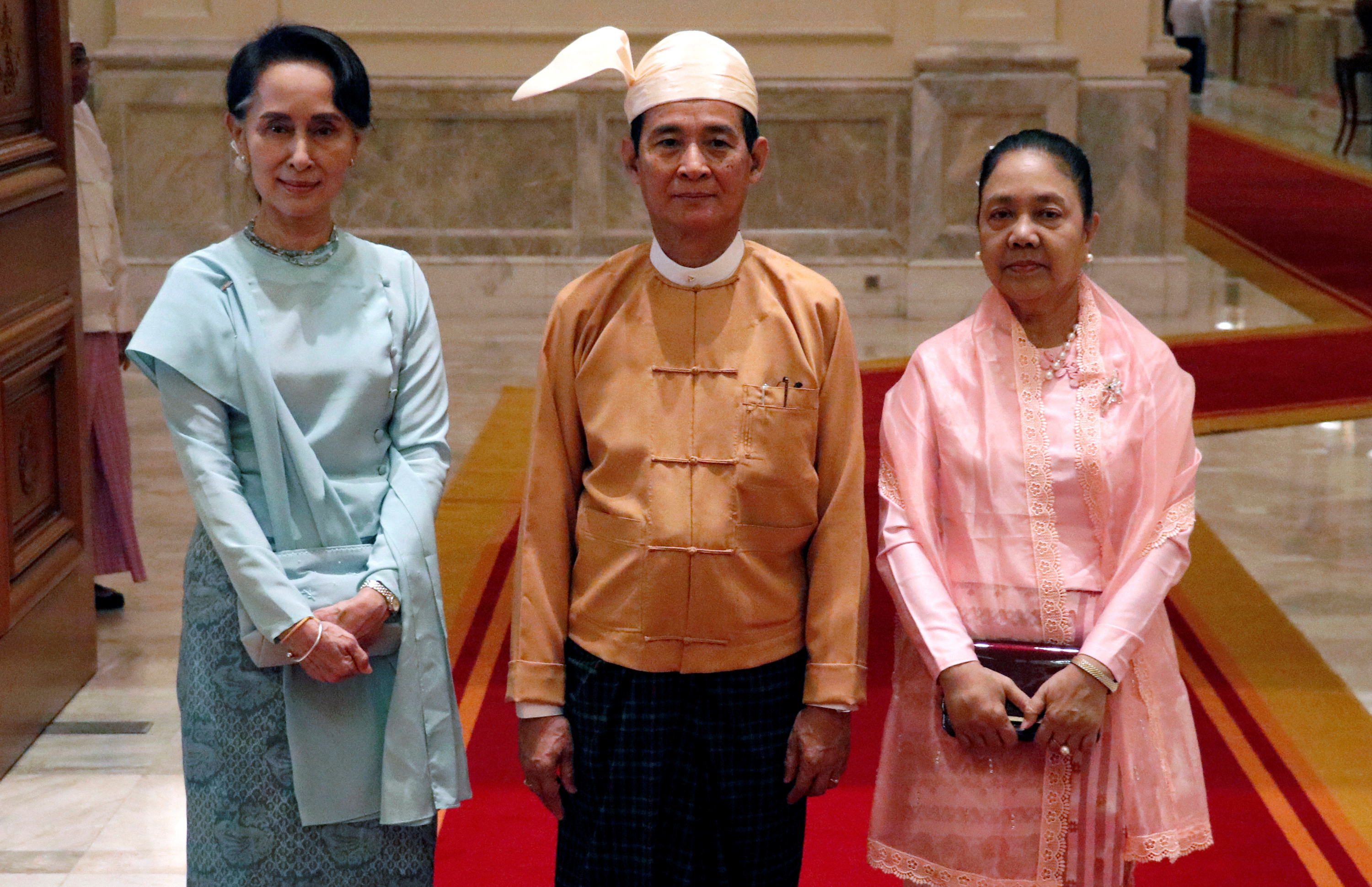 زعيمة ميانمار والرئيس الجديد لميانمار  وقرينته